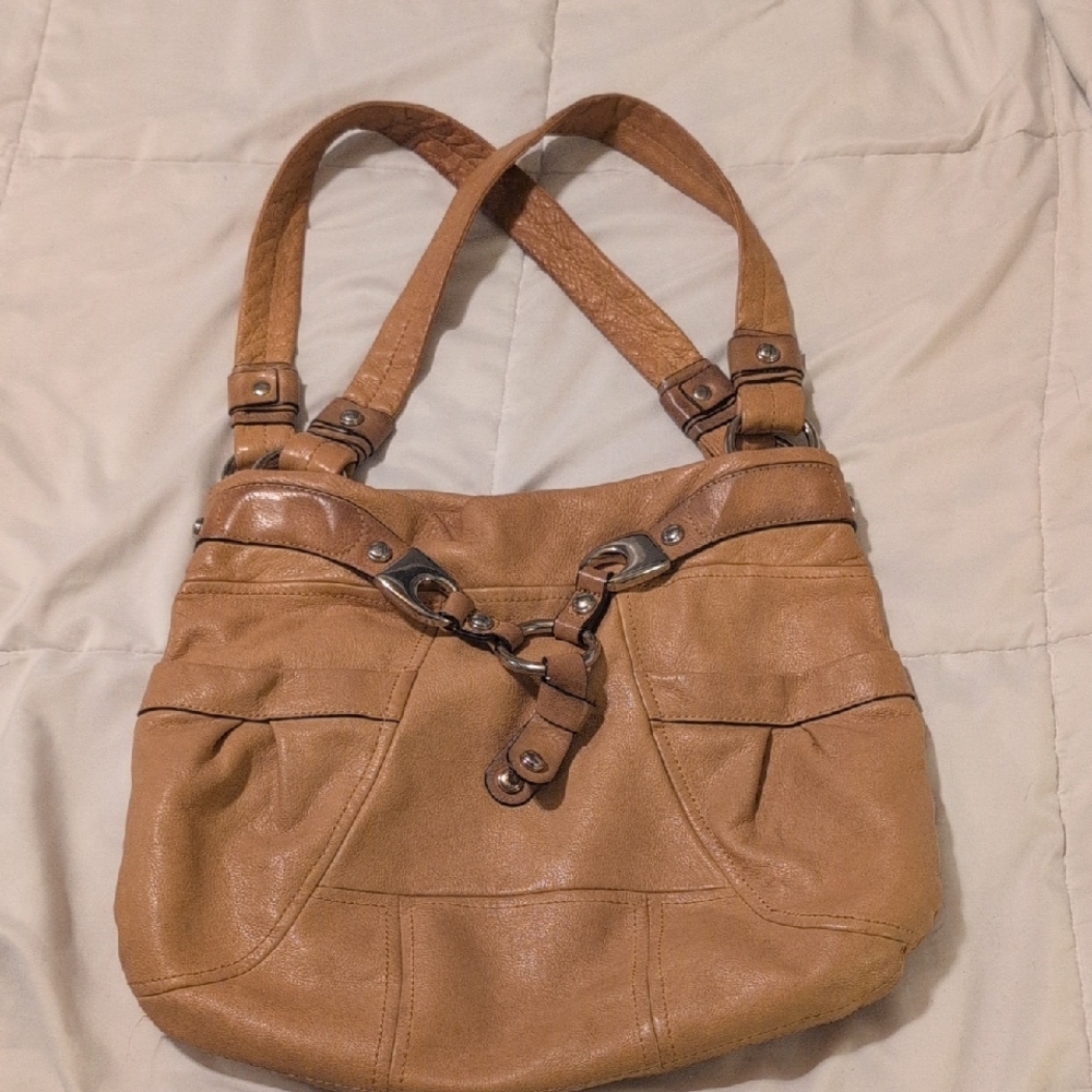 B. Makowsky tan leather handbag featuring a leopard print